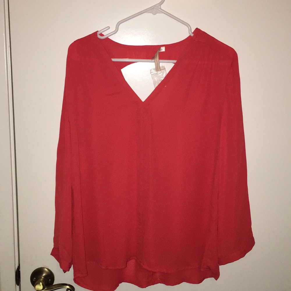 NWT long sleeve blouse with back cutout